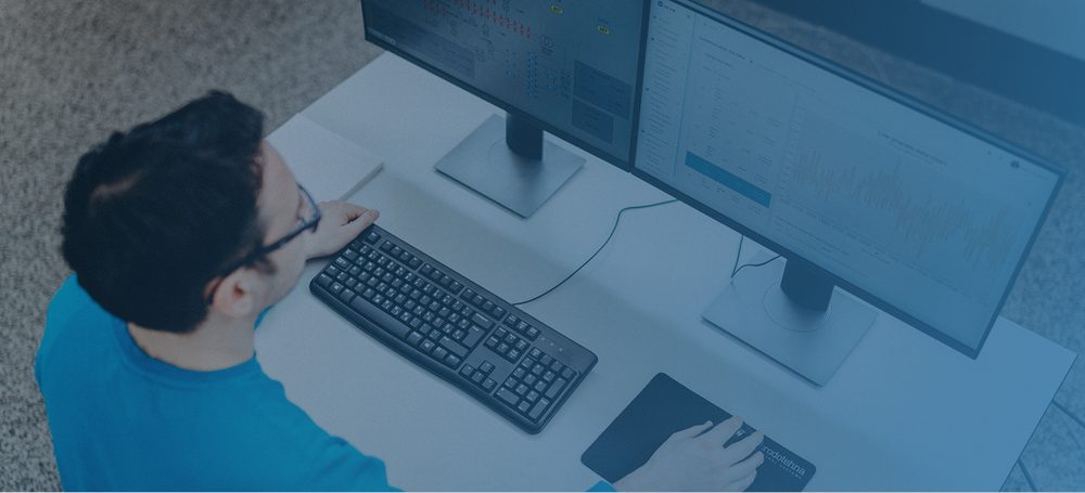 Brodotehna engineer working at a control system workstation